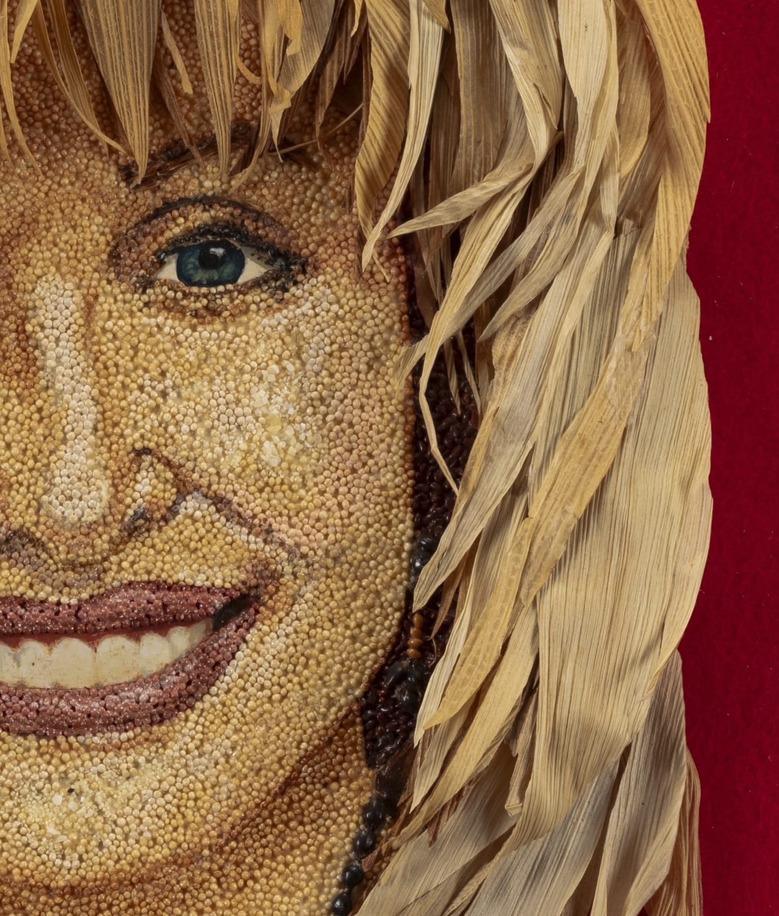 a detail of a seed art portrait of Dolly Parton